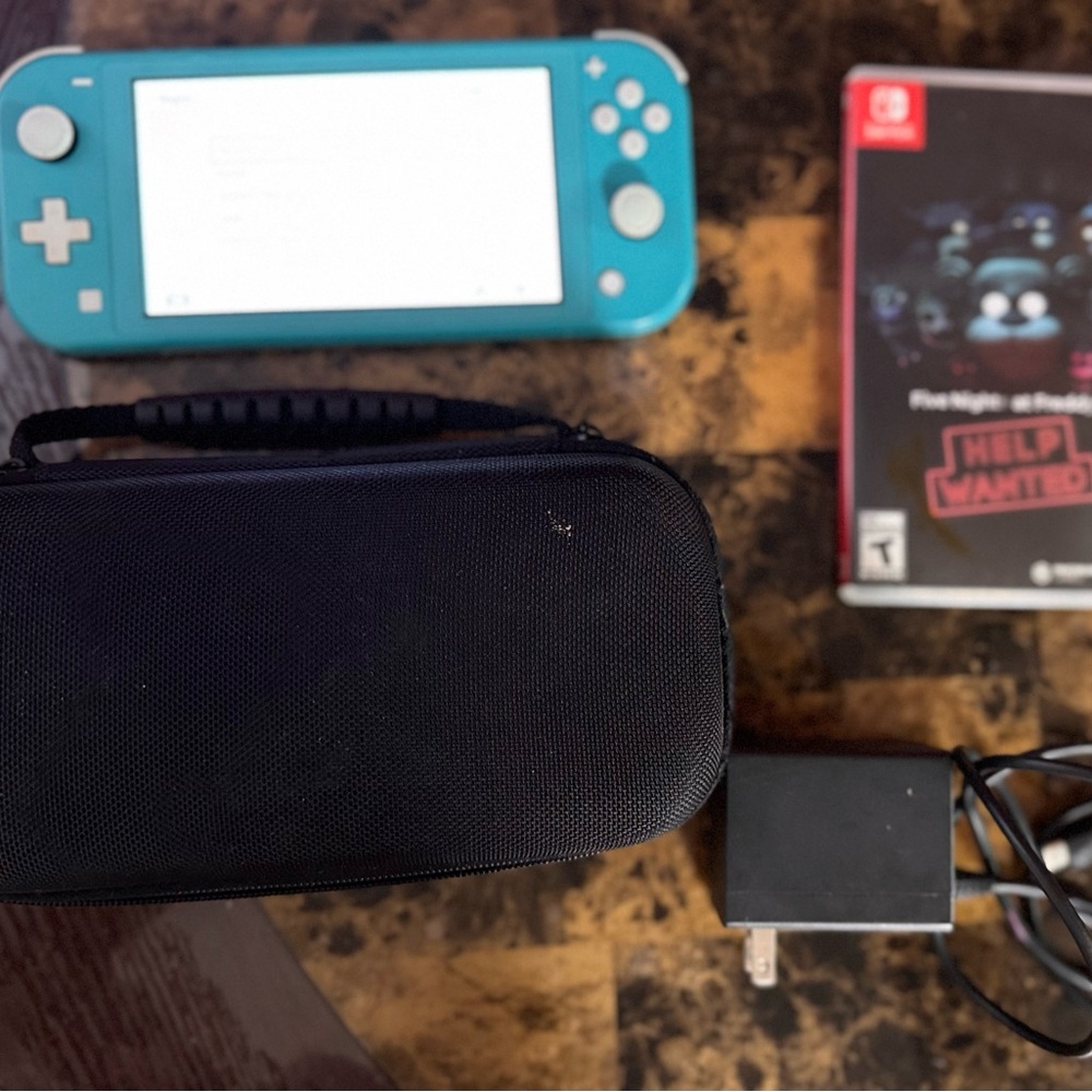 $150 for Nintendo switch lite,with case, and a game.
